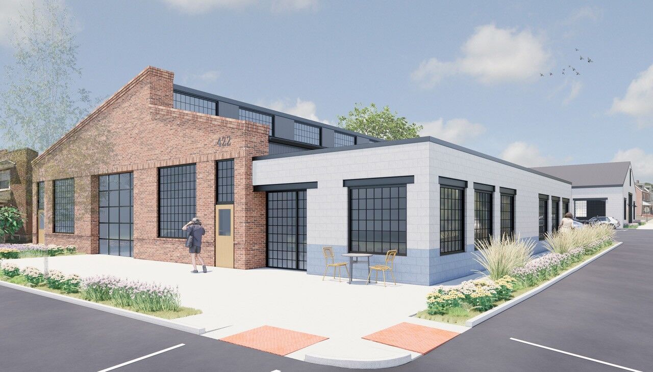 Redeveloped Lancaster city warehouse to include motorcycle garage, coffee shop